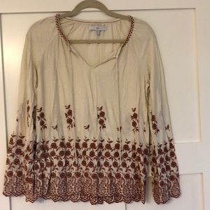 Embroidered blouse with bell sleeves